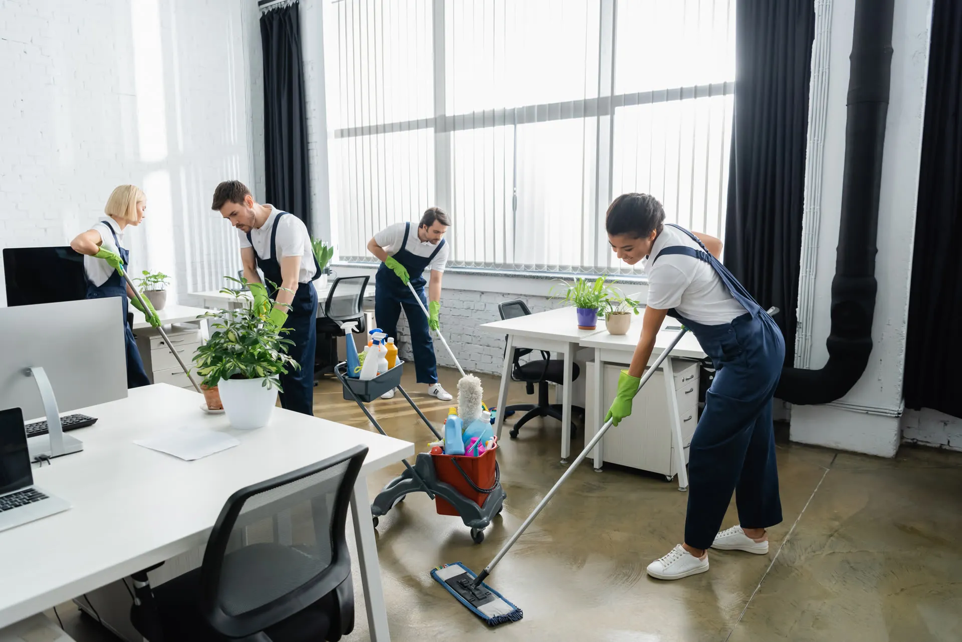 Glō team cleaning an open-plan office